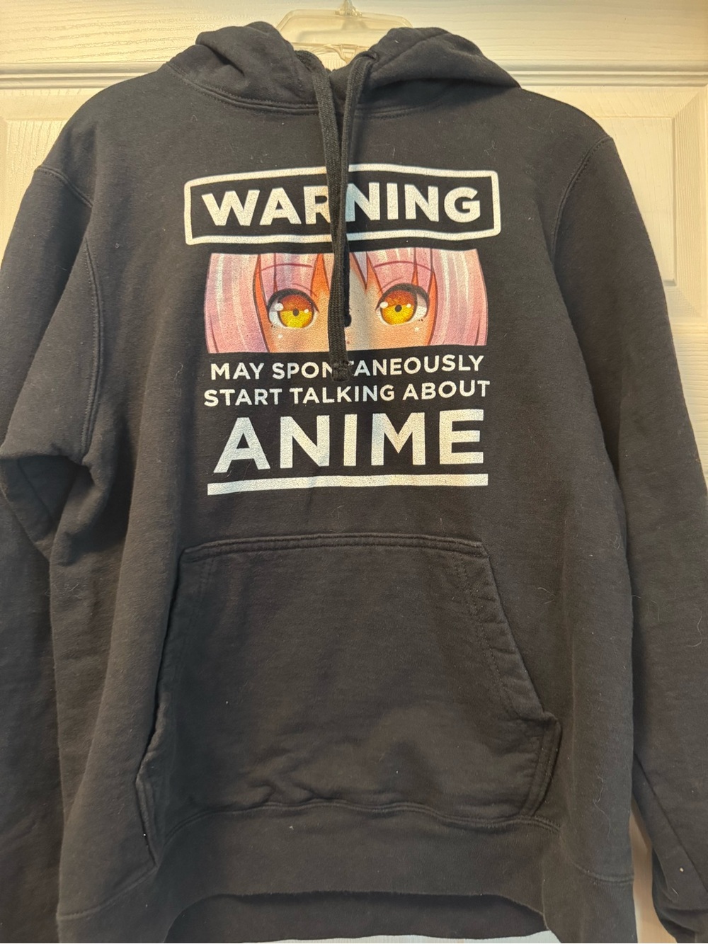 Port and Company Black Crewneck Hoodie with Pink Anime Eyes Graphic